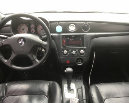 Чорний Міцубісі Аутлендер, об'ємом двигуна 2.4 л та пробігом 314 тис. км за 5000 $, фото 6 на Automoto.ua