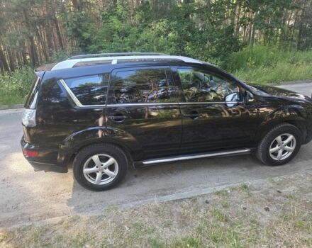 Чорний Міцубісі Аутлендер, об'ємом двигуна 2 л та пробігом 247 тис. км за 9600 $, фото 1 на Automoto.ua