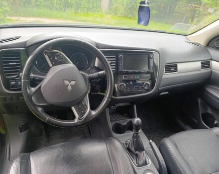 Чорний Міцубісі Аутлендер, об'ємом двигуна 2.3 л та пробігом 220 тис. км за 340 $, фото 4 на Automoto.ua