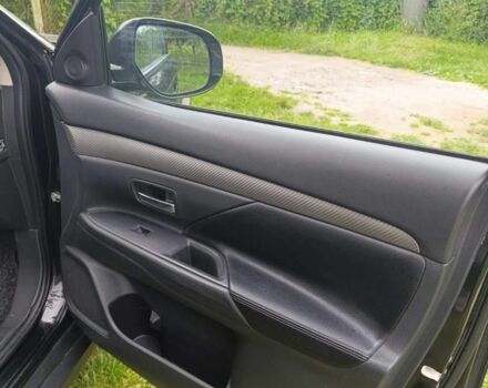 Чорний Міцубісі Аутлендер, об'ємом двигуна 2.3 л та пробігом 220 тис. км за 340 $, фото 13 на Automoto.ua