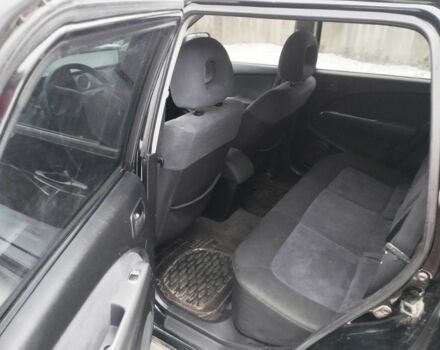 Чорний Міцубісі Аутлендер, об'ємом двигуна 2 л та пробігом 251 тис. км за 4990 $, фото 8 на Automoto.ua