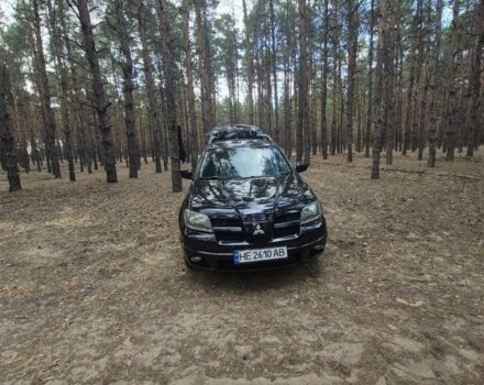 Черный Мицубиси Аутлендер, объемом двигателя 2.4 л и пробегом 312 тыс. км за 6500 $, фото 4 на Automoto.ua