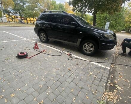 Черный Мицубиси Аутлендер, объемом двигателя 2.4 л и пробегом 312 тыс. км за 6500 $, фото 2 на Automoto.ua