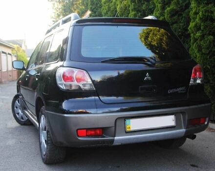 Чорний Міцубісі Аутлендер, об'ємом двигуна 2 л та пробігом 251 тис. км за 4990 $, фото 1 на Automoto.ua