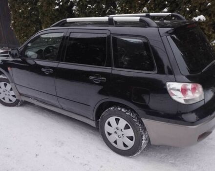 Чорний Міцубісі Аутлендер, об'ємом двигуна 2 л та пробігом 251 тис. км за 4990 $, фото 3 на Automoto.ua