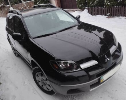 Чорний Міцубісі Аутлендер, об'ємом двигуна 2 л та пробігом 251 тис. км за 4990 $, фото 5 на Automoto.ua