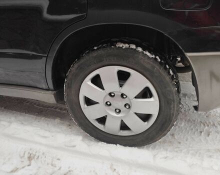 Чорний Міцубісі Аутлендер, об'ємом двигуна 2 л та пробігом 251 тис. км за 4990 $, фото 12 на Automoto.ua