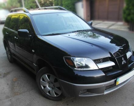 Чорний Міцубісі Аутлендер, об'ємом двигуна 2 л та пробігом 251 тис. км за 4990 $, фото 2 на Automoto.ua