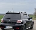 Чорний Міцубісі Аутлендер, об'ємом двигуна 2 л та пробігом 230 тис. км за 6300 $, фото 2 на Automoto.ua