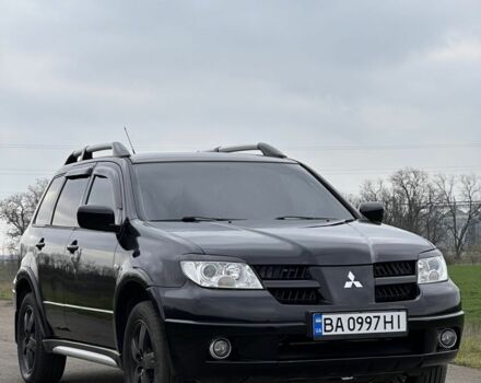 Чорний Міцубісі Аутлендер, об'ємом двигуна 2 л та пробігом 230 тис. км за 6300 $, фото 4 на Automoto.ua