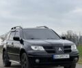 Чорний Міцубісі Аутлендер, об'ємом двигуна 2 л та пробігом 230 тис. км за 6300 $, фото 4 на Automoto.ua