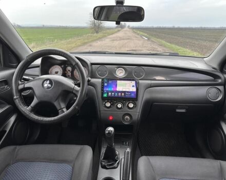 Чорний Міцубісі Аутлендер, об'ємом двигуна 2 л та пробігом 230 тис. км за 6300 $, фото 5 на Automoto.ua