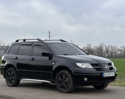 Чорний Міцубісі Аутлендер, об'ємом двигуна 2 л та пробігом 230 тис. км за 6300 $, фото 3 на Automoto.ua