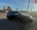 Черный Мицубиси Аутлендер, объемом двигателя 2.4 л и пробегом 182 тыс. км за 8500 $, фото 1 на Automoto.ua