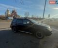 Черный Мицубиси Аутлендер, объемом двигателя 2.4 л и пробегом 182 тыс. км за 8500 $, фото 1 на Automoto.ua