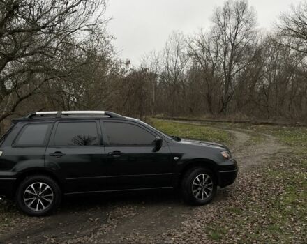 Черный Мицубиси Аутлендер, объемом двигателя 2.4 л и пробегом 200 тыс. км за 5800 $, фото 5 на Automoto.ua