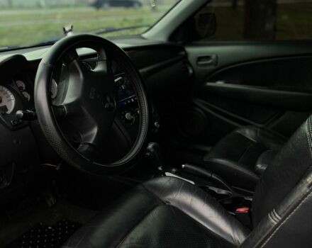 Черный Мицубиси Аутлендер, объемом двигателя 2.4 л и пробегом 200 тыс. км за 5800 $, фото 8 на Automoto.ua