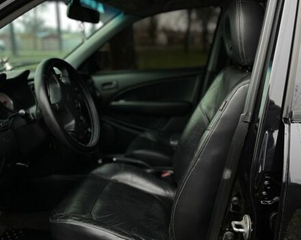 Черный Мицубиси Аутлендер, объемом двигателя 2.4 л и пробегом 200 тыс. км за 5800 $, фото 7 на Automoto.ua