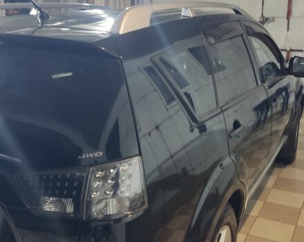 Черный Мицубиси Аутлендер, объемом двигателя 2.4 л и пробегом 270 тыс. км за 8629 $, фото 3 на Automoto.ua