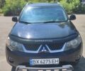 Чорний Міцубісі Аутлендер, об'ємом двигуна 2.4 л та пробігом 180 тис. км за 9000 $, фото 1 на Automoto.ua