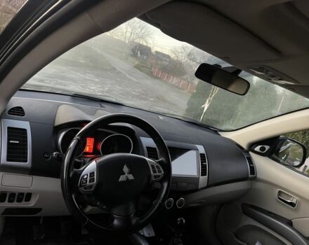 Черный Мицубиси Аутлендер, объемом двигателя 2.2 л и пробегом 238 тыс. км за 9700 $, фото 18 на Automoto.ua