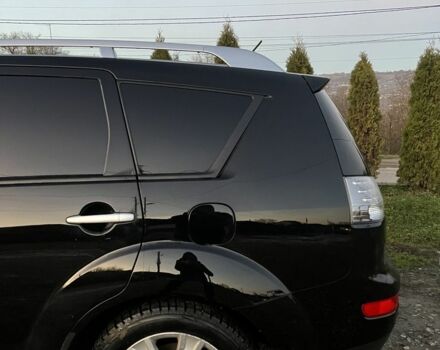 Черный Мицубиси Аутлендер, объемом двигателя 2.2 л и пробегом 238 тыс. км за 9700 $, фото 13 на Automoto.ua