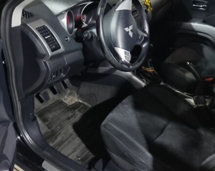 Черный Мицубиси Аутлендер, объемом двигателя 2.4 л и пробегом 270 тыс. км за 8629 $, фото 1 на Automoto.ua