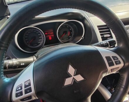 Чорний Міцубісі Аутлендер, об'ємом двигуна 2.4 л та пробігом 180 тис. км за 9000 $, фото 9 на Automoto.ua