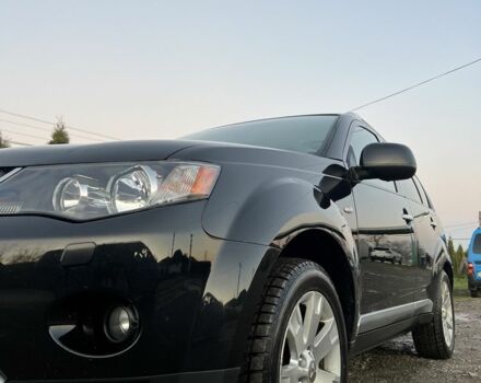 Черный Мицубиси Аутлендер, объемом двигателя 2.2 л и пробегом 238 тыс. км за 9700 $, фото 2 на Automoto.ua