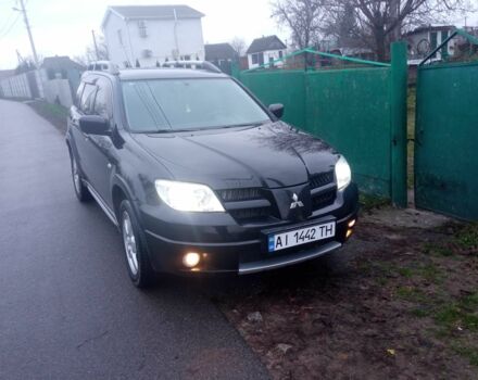 Чорний Міцубісі Аутлендер, об'ємом двигуна 2 л та пробігом 220 тис. км за 5599 $, фото 3 на Automoto.ua