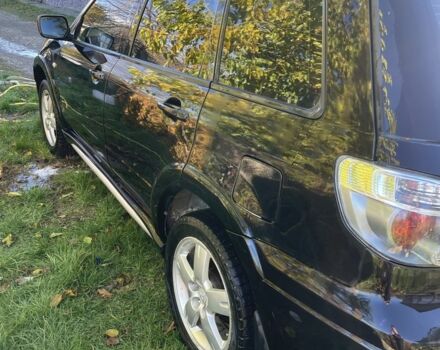 Черный Мицубиси Аутлендер, объемом двигателя 2 л и пробегом 156 тыс. км за 4200 $, фото 4 на Automoto.ua