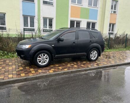 Чорний Міцубісі Аутлендер, об'ємом двигуна 2.4 л та пробігом 260 тис. км за 10000 $, фото 1 на Automoto.ua