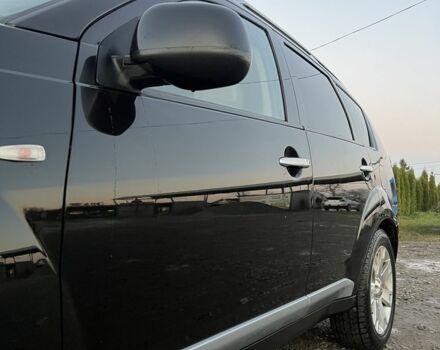 Черный Мицубиси Аутлендер, объемом двигателя 2.2 л и пробегом 238 тыс. км за 9700 $, фото 3 на Automoto.ua