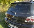 Черный Мицубиси Аутлендер, объемом двигателя 2 л и пробегом 156 тыс. км за 4200 $, фото 5 на Automoto.ua