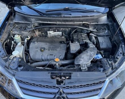 Черный Мицубиси Аутлендер, объемом двигателя 2.4 л и пробегом 220 тыс. км за 9500 $, фото 5 на Automoto.ua