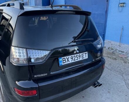 Черный Мицубиси Аутлендер, объемом двигателя 2.4 л и пробегом 220 тыс. км за 9500 $, фото 3 на Automoto.ua