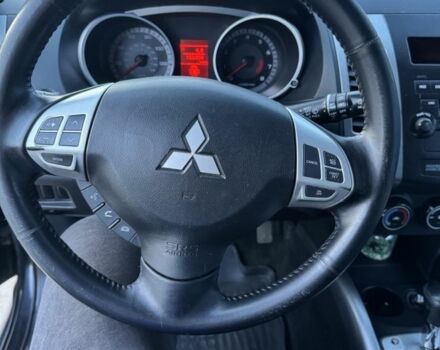 Черный Мицубиси Аутлендер, объемом двигателя 2.4 л и пробегом 220 тыс. км за 9500 $, фото 4 на Automoto.ua