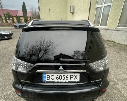 Черный Мицубиси Аутлендер, объемом двигателя 2.2 л и пробегом 186 тыс. км за 11200 $, фото 2 на Automoto.ua