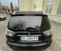 Черный Мицубиси Аутлендер, объемом двигателя 2.2 л и пробегом 186 тыс. км за 11200 $, фото 2 на Automoto.ua