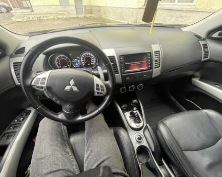 Черный Мицубиси Аутлендер, объемом двигателя 2.2 л и пробегом 186 тыс. км за 11200 $, фото 1 на Automoto.ua