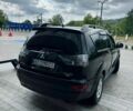 Чорний Міцубісі Аутлендер, об'ємом двигуна 2 л та пробігом 210 тис. км за 9400 $, фото 6 на Automoto.ua
