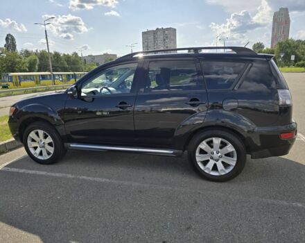 Чорний Міцубісі Аутлендер, об'ємом двигуна 2.4 л та пробігом 261 тис. км за 10700 $, фото 1 на Automoto.ua