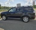 Мицубиси Аутлендер 2012 в Киеве на Automoto.ua Черный Мицубиси Аутлендер, объемом двигателя 2.4 л и пробегом 261 тыс. км за 10900 $, фото 1 на Automoto.ua