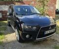 Мицубиси Аутлендер 2012 в Киеве на Automoto.ua Черный Мицубиси Аутлендер, объемом двигателя 2.4 л и пробегом 261 тыс. км за 10900 $, фото 6 на Automoto.ua