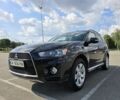 Чорний Міцубісі Аутлендер, об'ємом двигуна 2.4 л та пробігом 261 тис. км за 10700 $, фото 1 на Automoto.ua