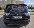 Чорний Міцубісі Аутлендер, об'ємом двигуна 2.4 л та пробігом 261 тис. км за 10700 $, фото 5 на Automoto.ua