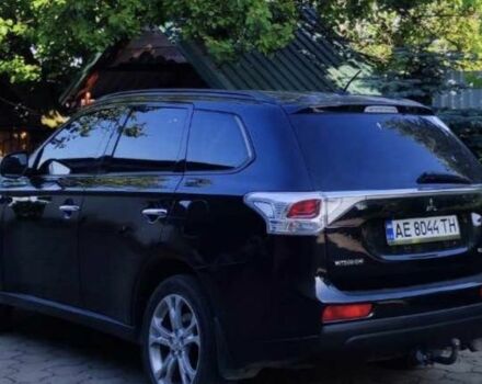 Черный Мицубиси Аутлендер, объемом двигателя 2.4 л и пробегом 220 тыс. км за 13400 $, фото 2 на Automoto.ua