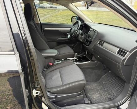 Черный Мицубиси Аутлендер, объемом двигателя 2.4 л и пробегом 130 тыс. км за 14950 $, фото 6 на Automoto.ua