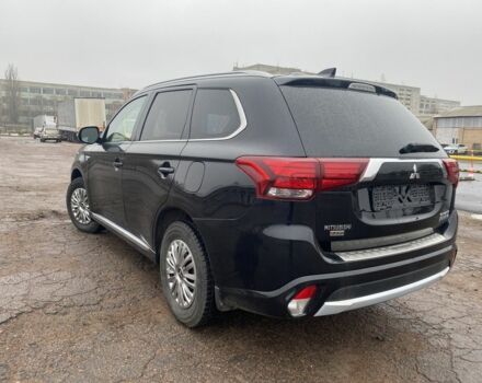 Черный Мицубиси Аутлендер, объемом двигателя 2 л и пробегом 76 тыс. км за 20800 $, фото 1 на Automoto.ua