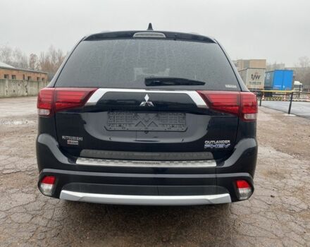 Черный Мицубиси Аутлендер, объемом двигателя 2 л и пробегом 76 тыс. км за 20800 $, фото 2 на Automoto.ua